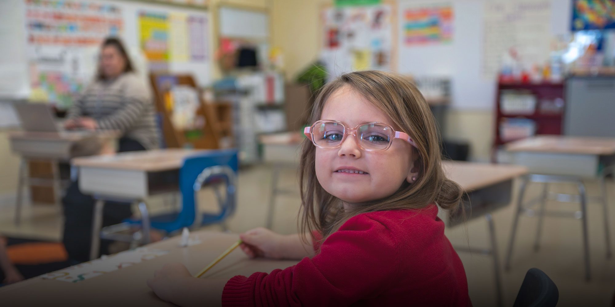 Elementary student sitting at desk